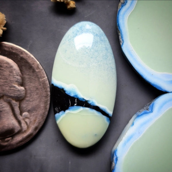 Natural Polychrome White River Oval Cabochon