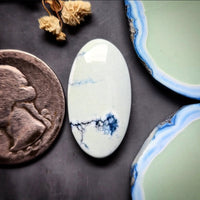 Natural Polychrome White River Oval Cabochon